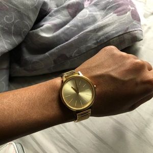 Gold Nixon watch